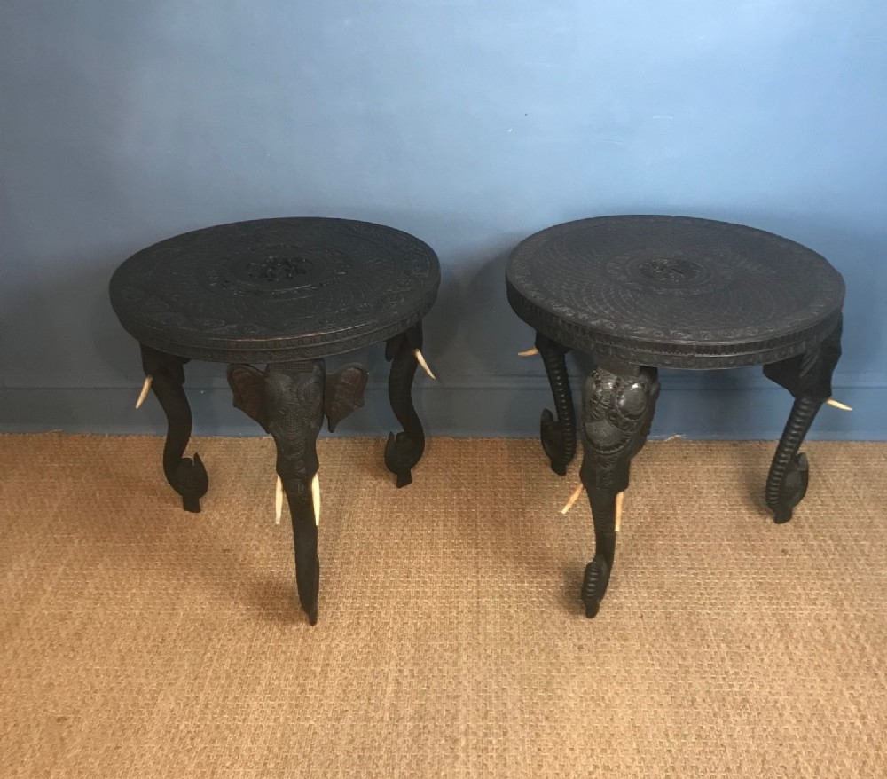 A matched pair of Bombay Presidency Black wood Elephant Tables circa 1890