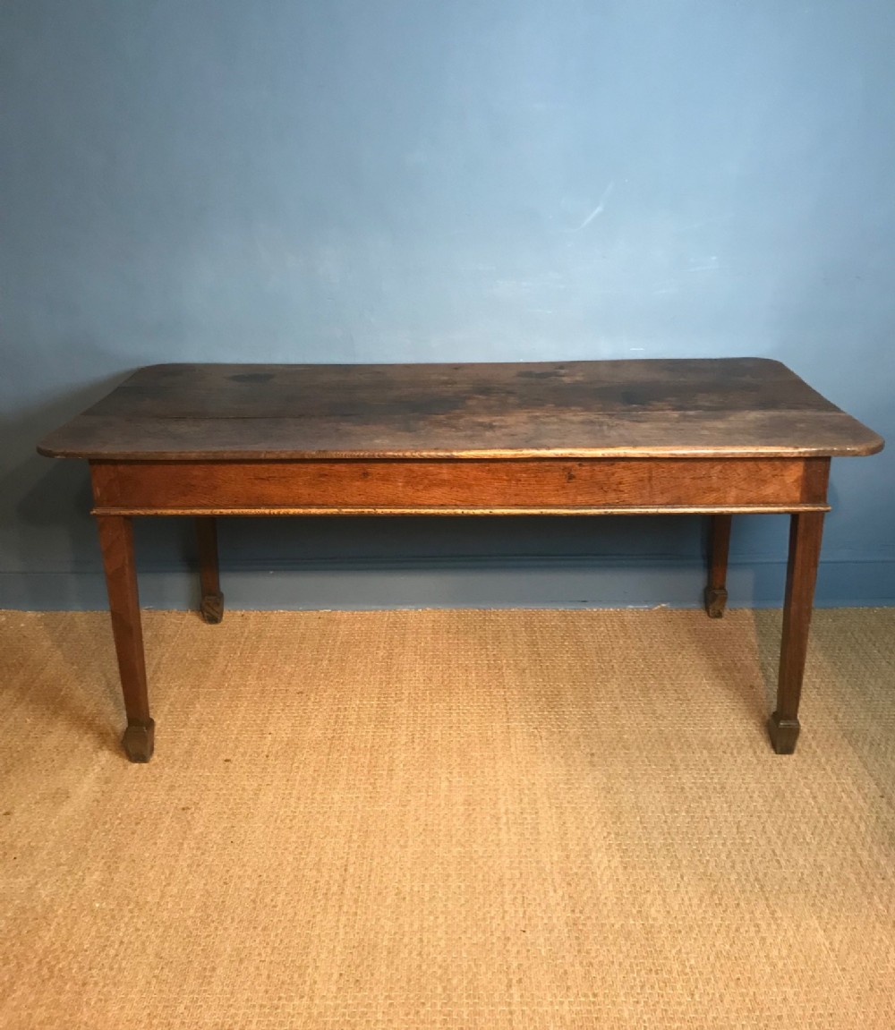 A  late Georgian West Country oak Farm table circa 1820