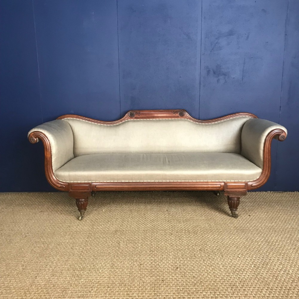 A large George IV rosewood sofa circa 1825  in the manner of Gillows