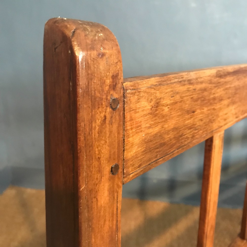 A South African stink wood and rattan seated sofa circa 1910 in excellent solid condition. View III