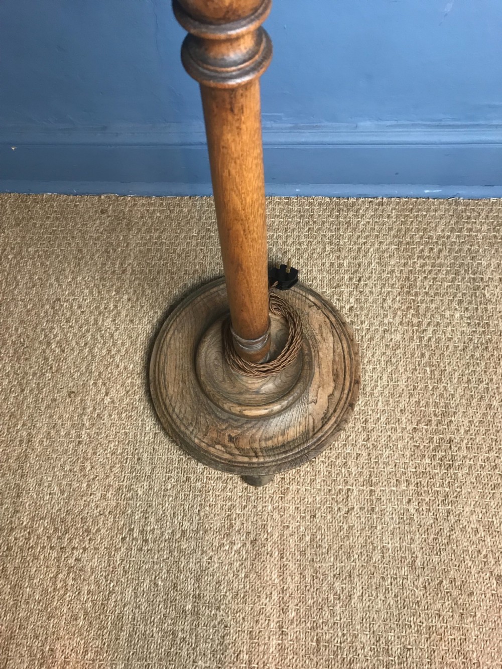 A 1920s oak barley twist standard lamp in the style of Heals View III
