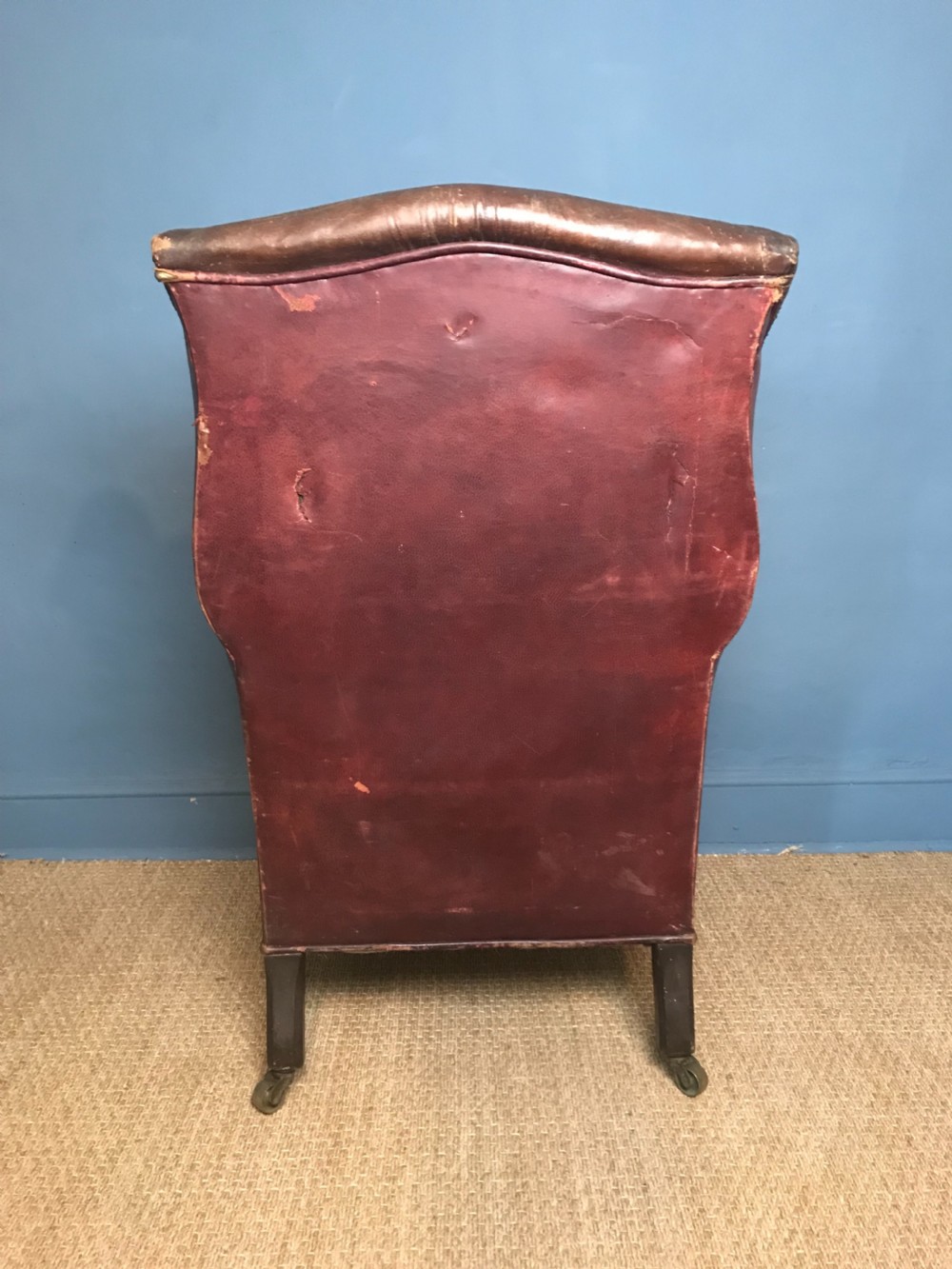 A late Victorian leather wing armchair c 1890  View III