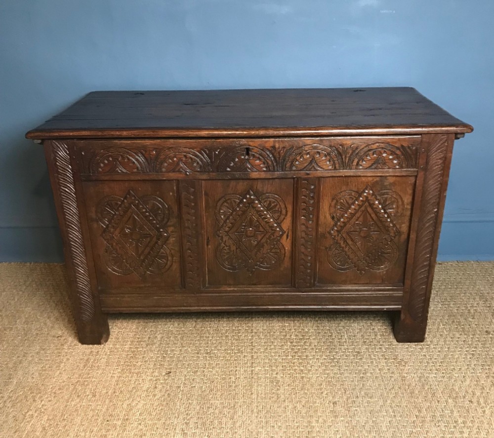 A late 17th c West Country Carved oak Coffer of small size .