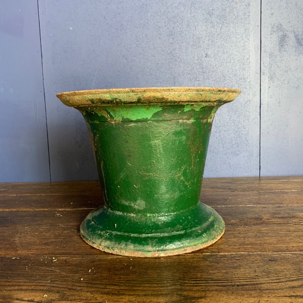 A late Georgian green painted iron mortar circa 1820 