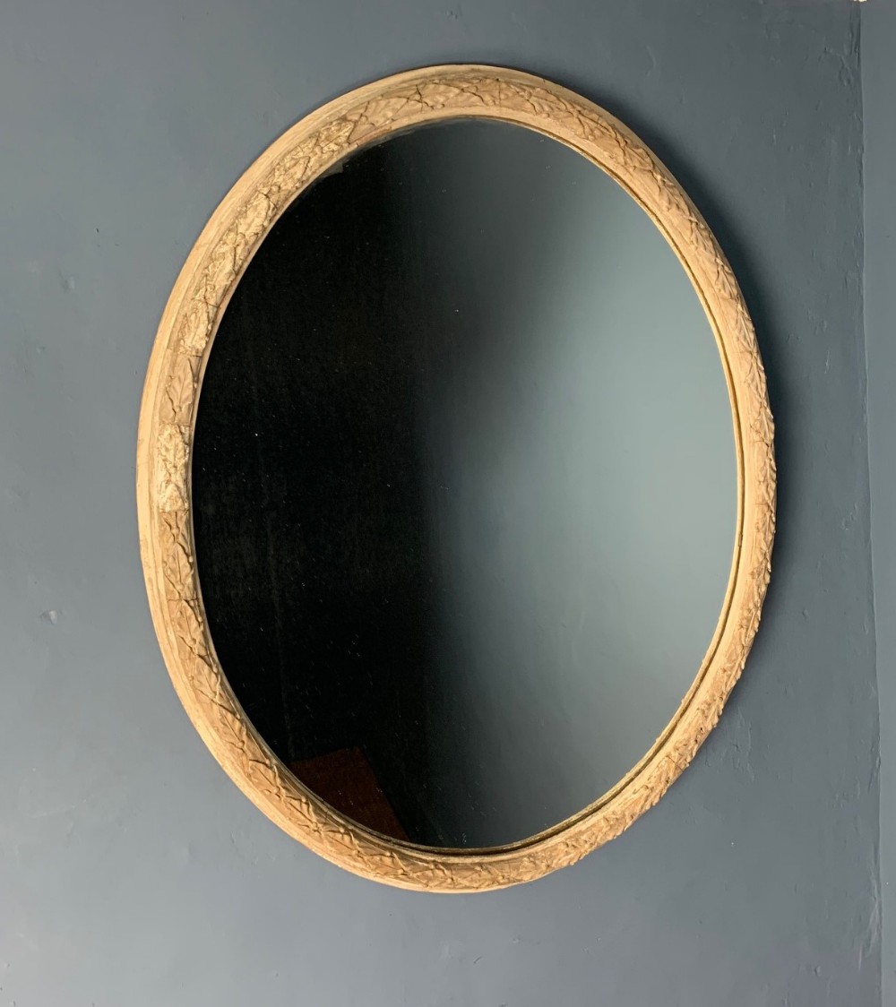 A William IV Oval mirror c 1835 in the original off white paint