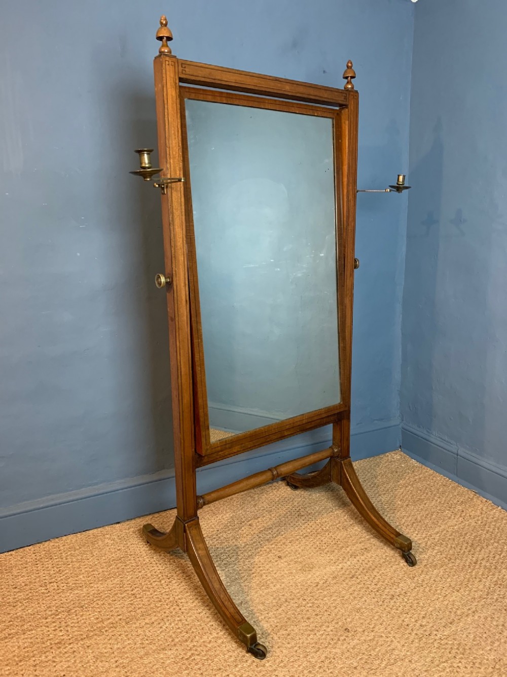 A Regency mahogany and ebony inlaid cheval mirror circa 1820
