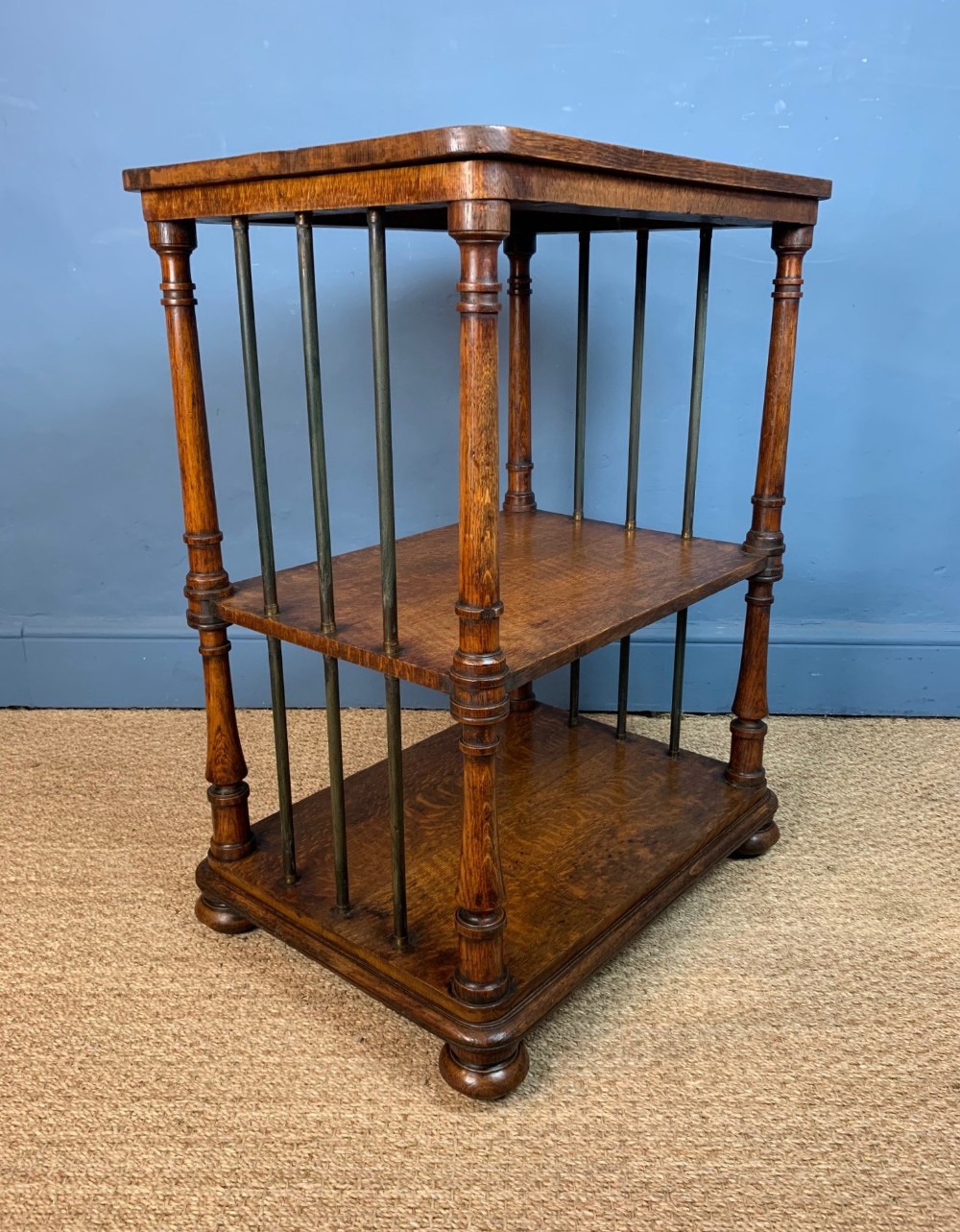 A Gillows of Lancaster oak and brass mounted 3 tier whatnot circa 1835