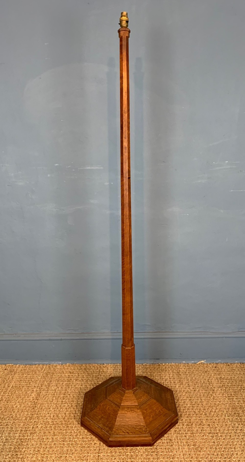 A Cotswold School oak standard lamp circa 1930 attributed to Gordon Russell
