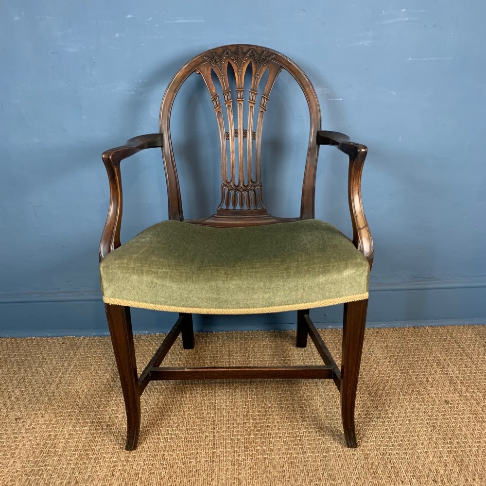 A Georgian Hepplewhite style arm or desk chair circa 1900