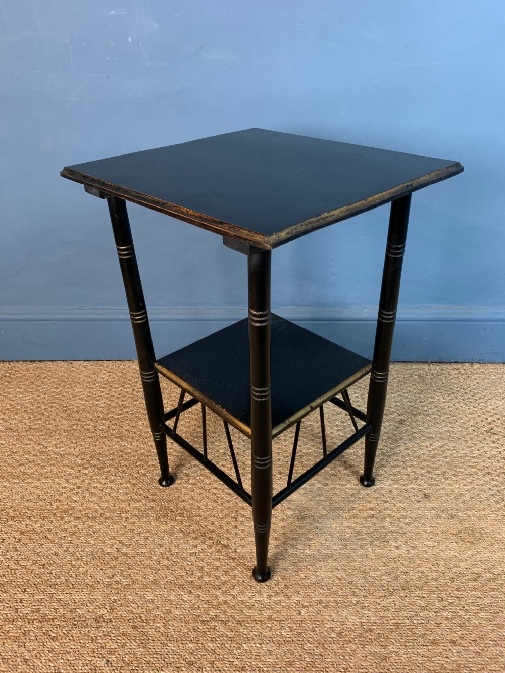 An E W Godwin  Aesthetic Movement ebonised and parcel gilt lamp table c 1880