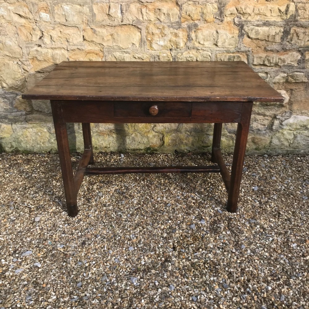 An early 19th c French oak farm table circa 1820