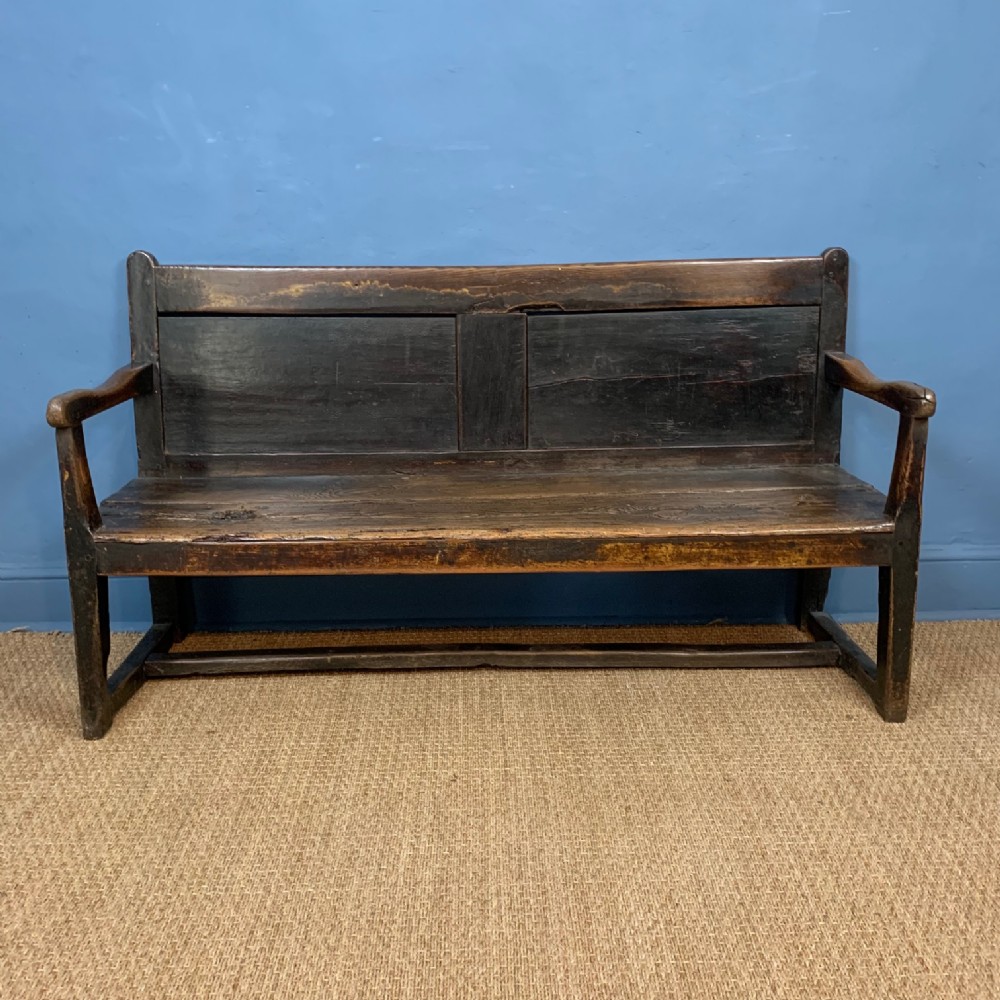 A small late 18th c West Country elm and oak settle