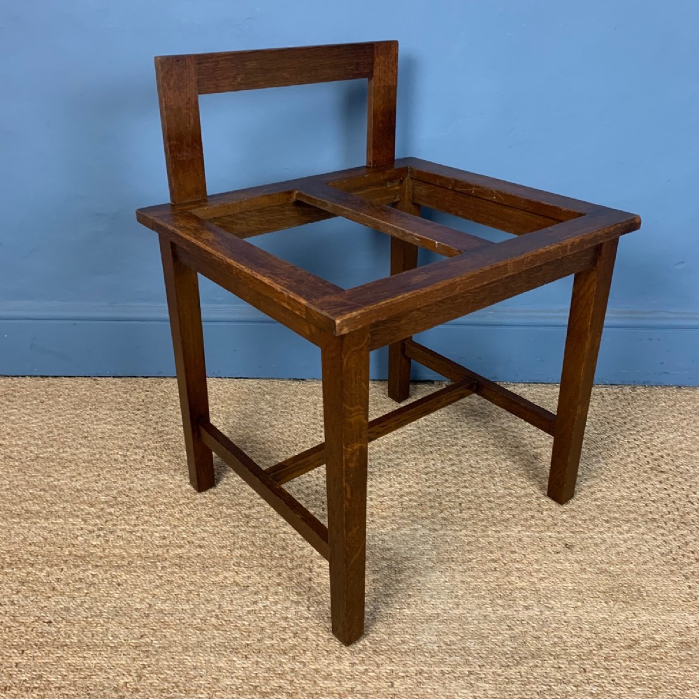 An Edwardian oak luggage rack circa 1910