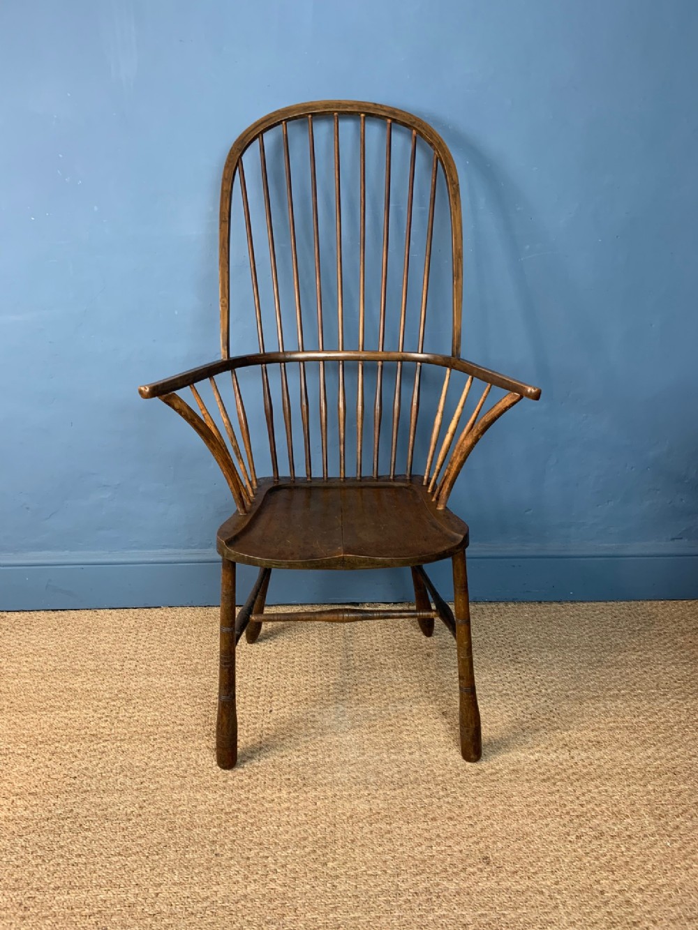 An Arts and Crafts elm and beech Windsor high back arm chair in Shaker style circa 1900 .