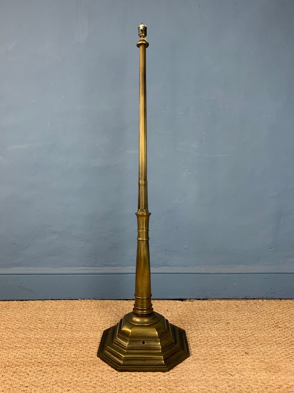 An Edwardian brass octagonal standard lamp circa 1910 