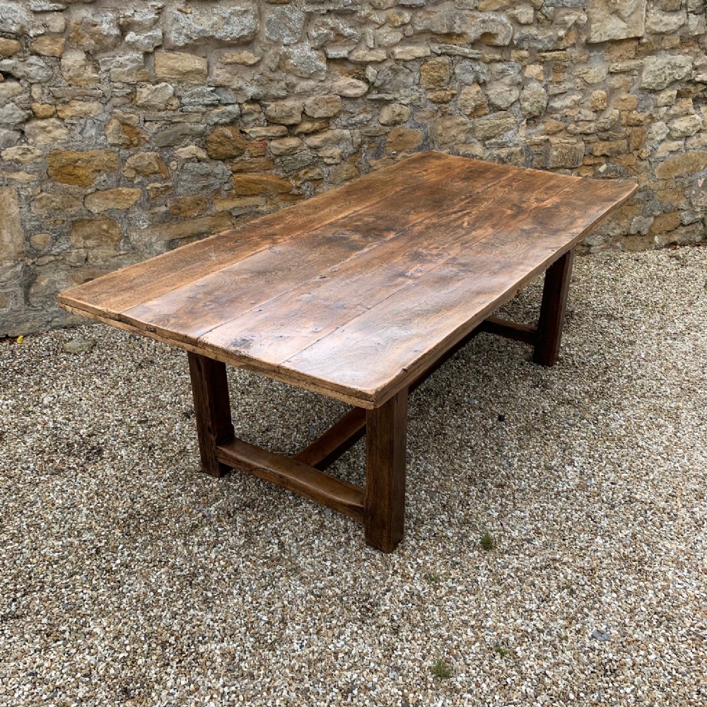 A large West Country elm farmhouse table circa 1920 in 18th century style