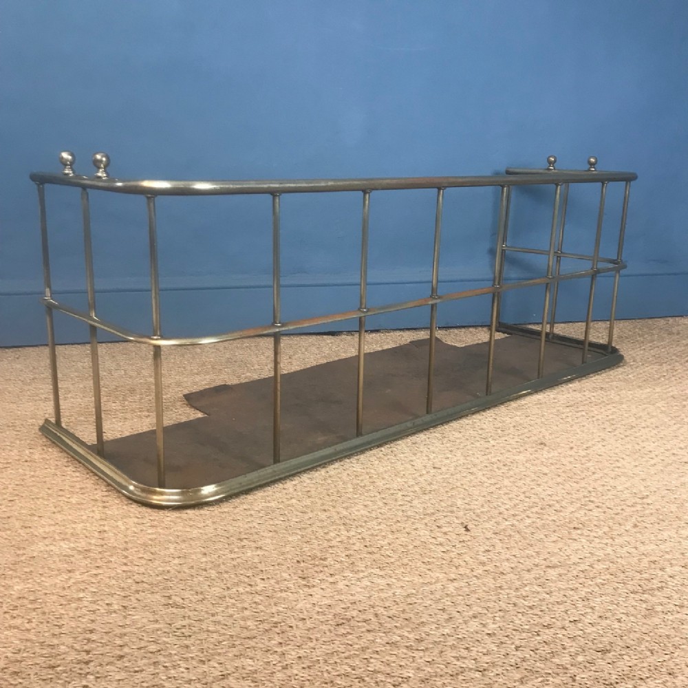 A 19th century brass fender circa 1880