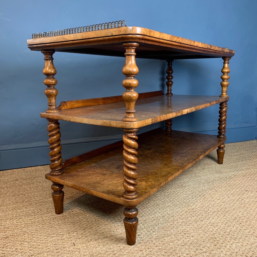 A fine mid 19th c burr walnut 3 tier stand circa 1860 attributed to Holland Sons