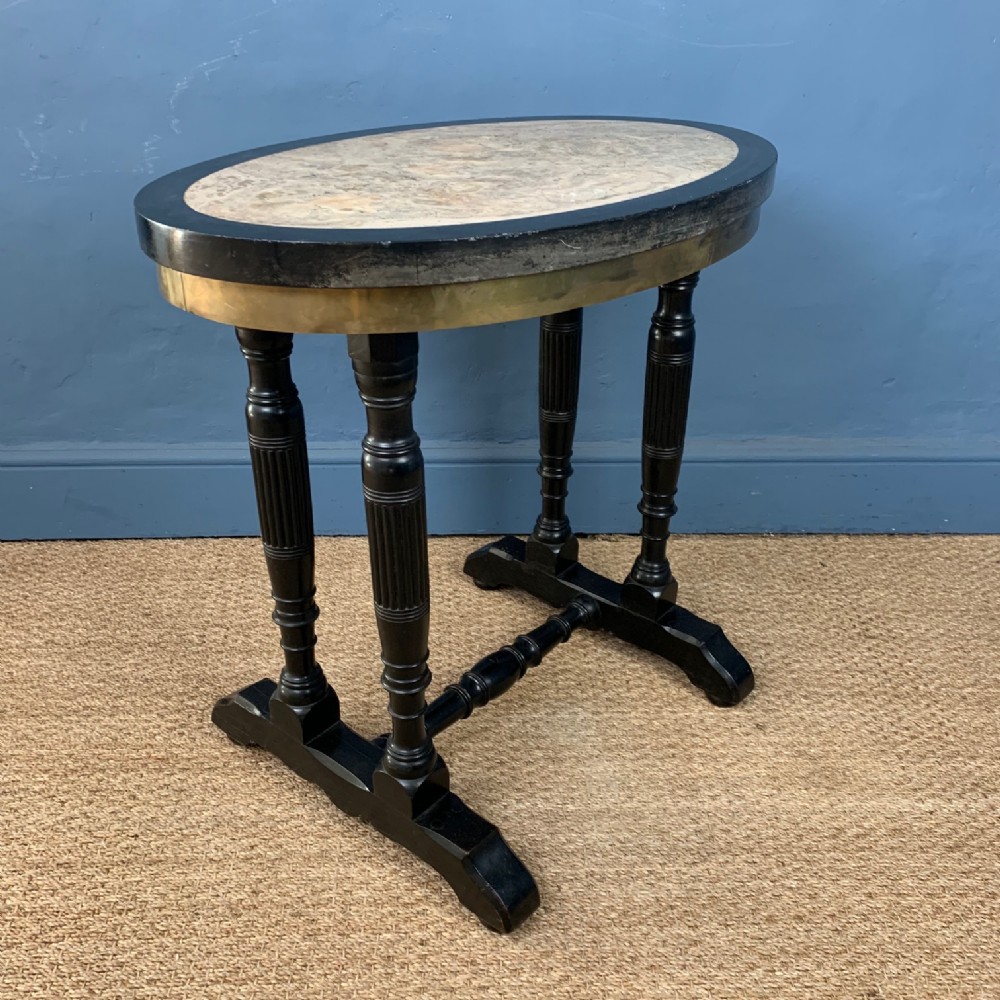 An Aesthetic Movement marble top oval table  c 1880 