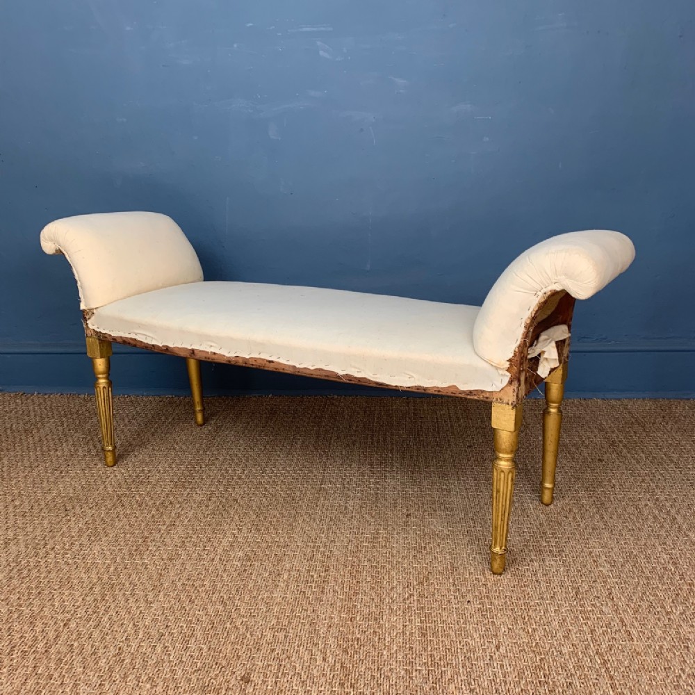 A George 111 Adam period gilt window seat circa 1790.