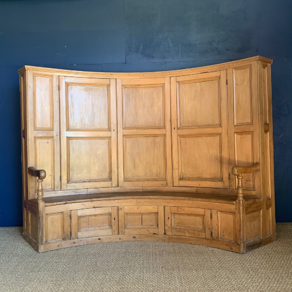 A monumental Georgian pine bacon settle circa 1800