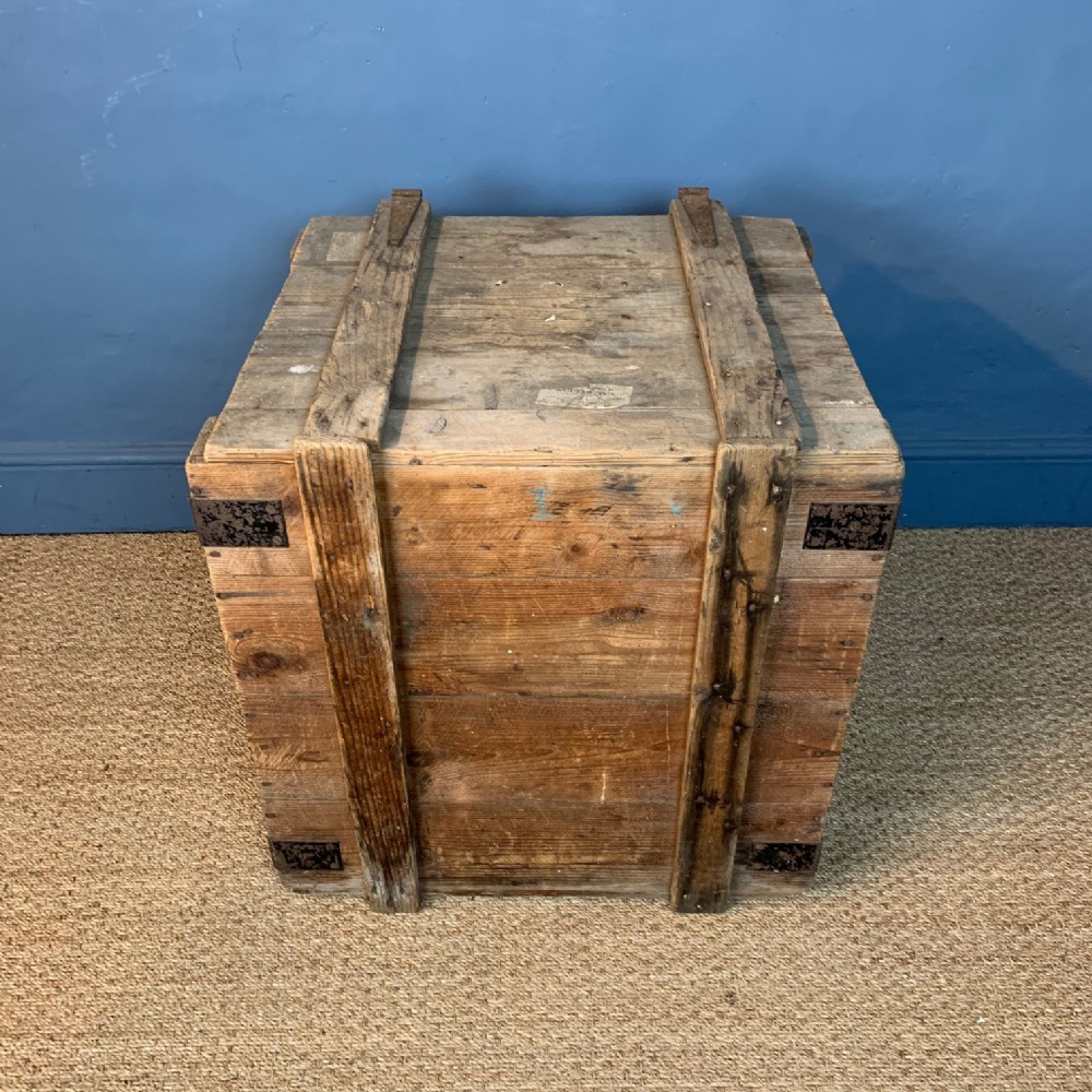 An Edwardian pine and iron banded log box circa 1910