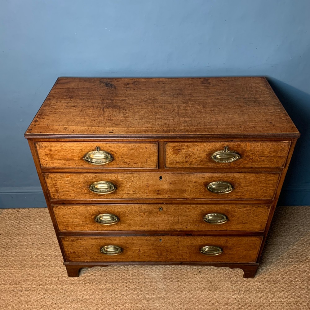 A George 111 oak chest of drawers circa 1820 View II