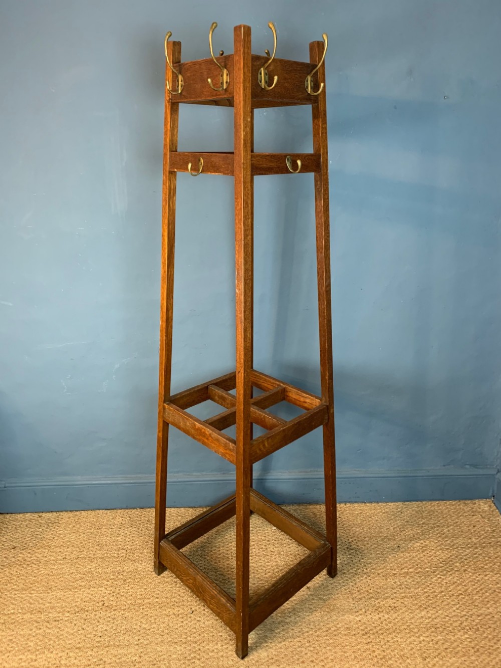 An Edwardian oak and brass hall stand circa 1910