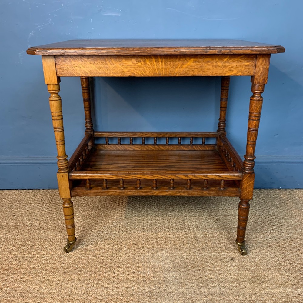 An Aesthetic Movement oak two tier table circa 1880 