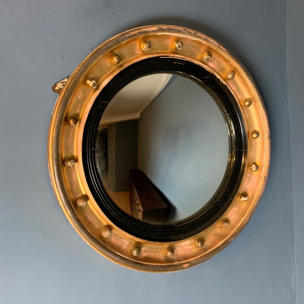 A Regency gilt Convex Mirror circa 1830