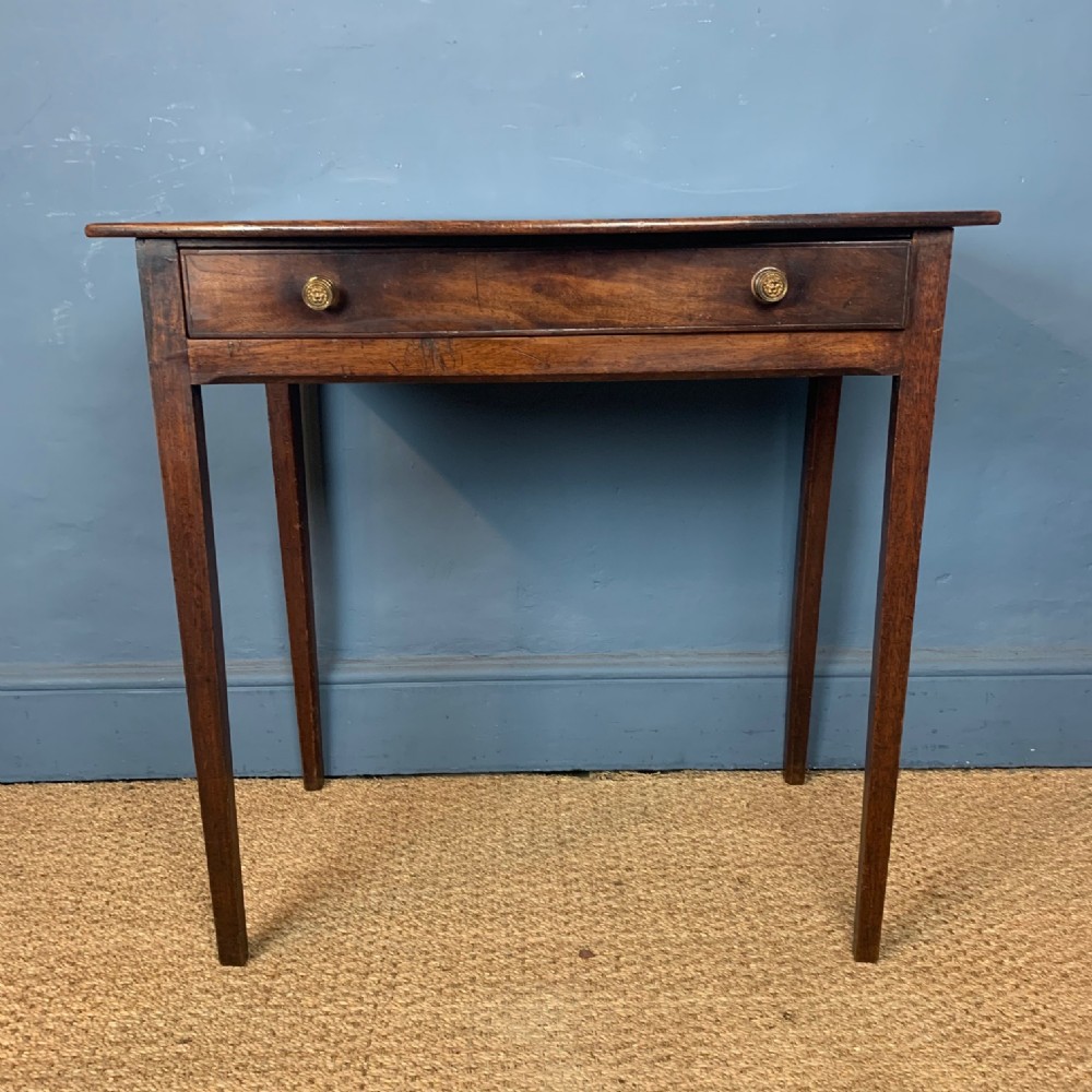A George 111 mahogany bow front side table circa 1820 