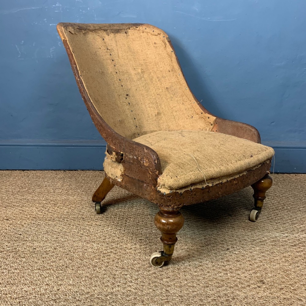 A Victorian walnut nursing chair circa 1870