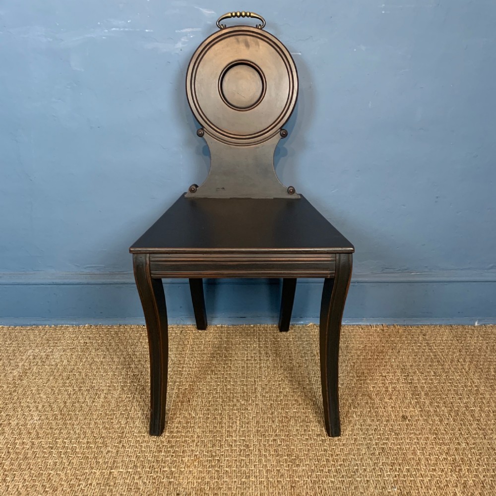 A George 111 Hepplewhite period ebonised mahogany hall chair circa 1800 