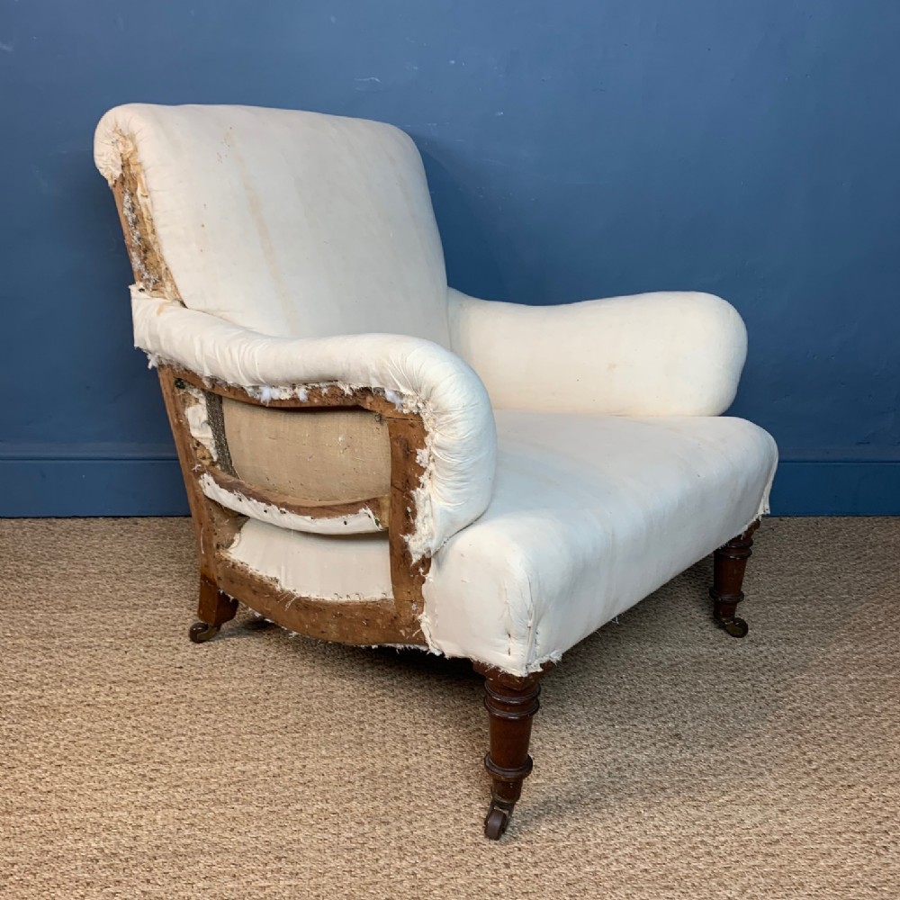 A good scale late Victorian walnut Howard Bridgwater design armchair circa 1890