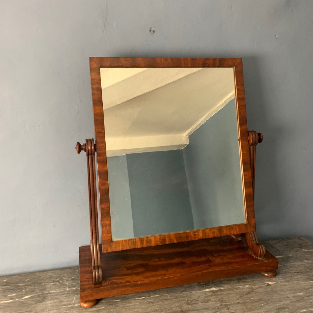 A George IV Gillows mahogany swing frame toilet mirror c 1825