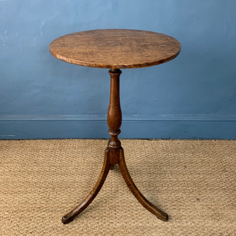 A Regency oak tripod table circa 1810