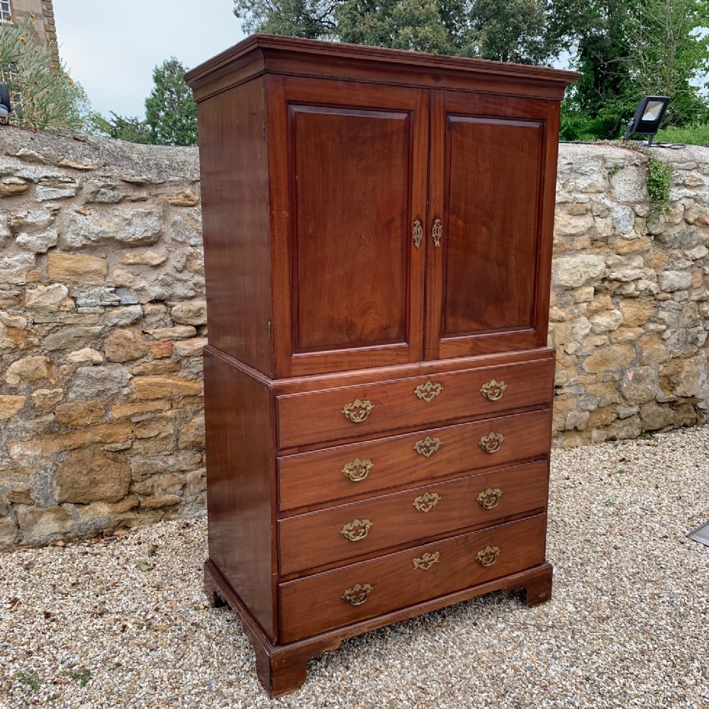 An early George 111 mahogany linen press circa 1760