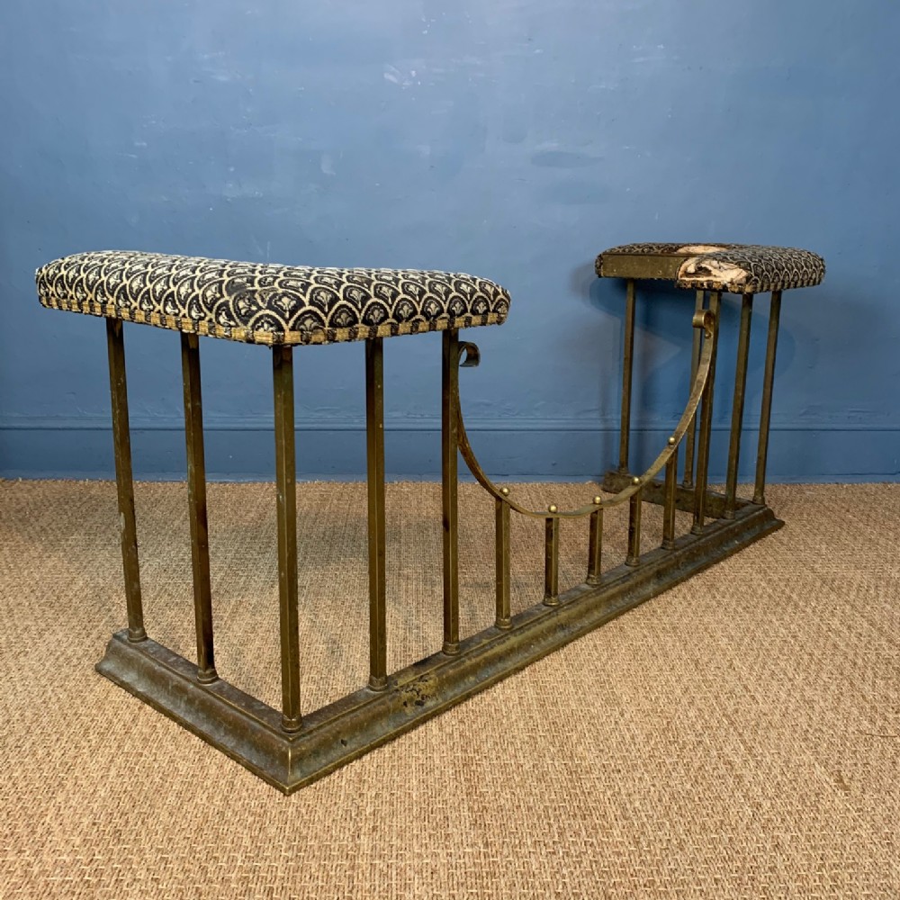 A late Victorian brass club fender circa 1900