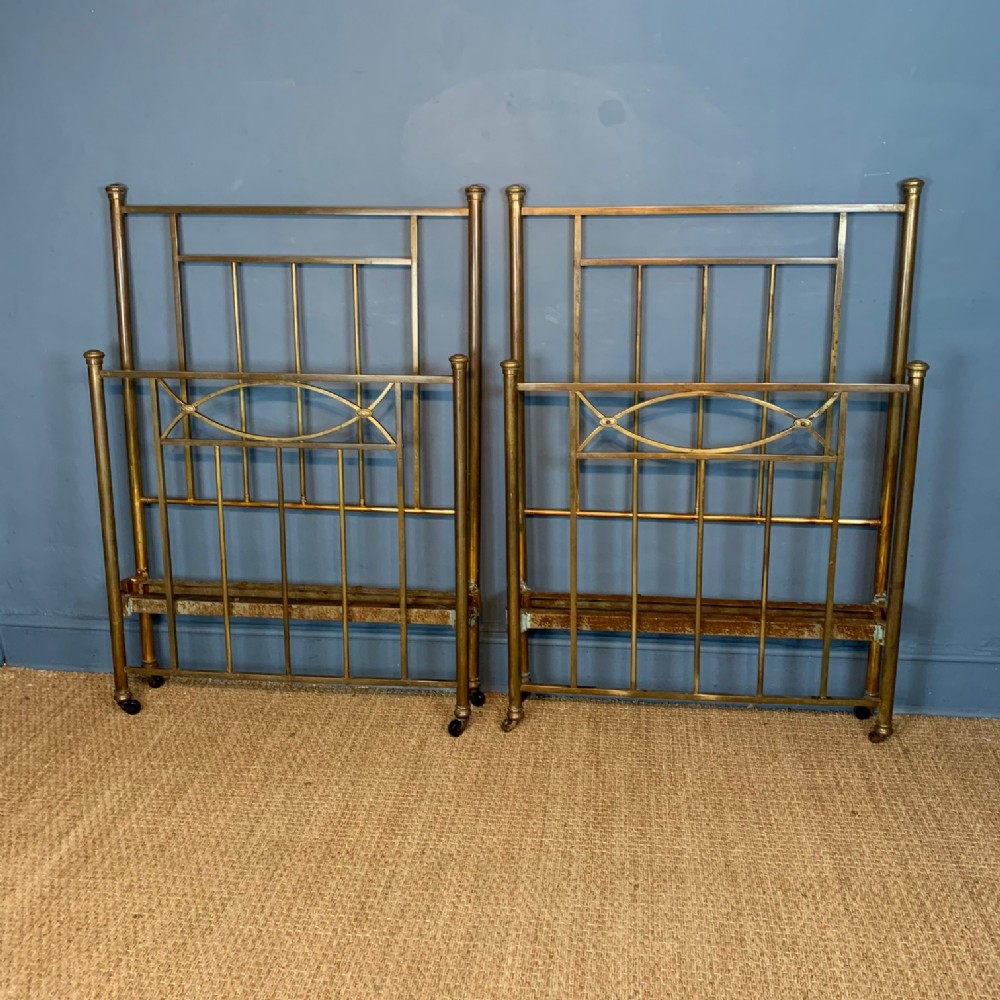 A pair of late Victorian brass beds circa 1890