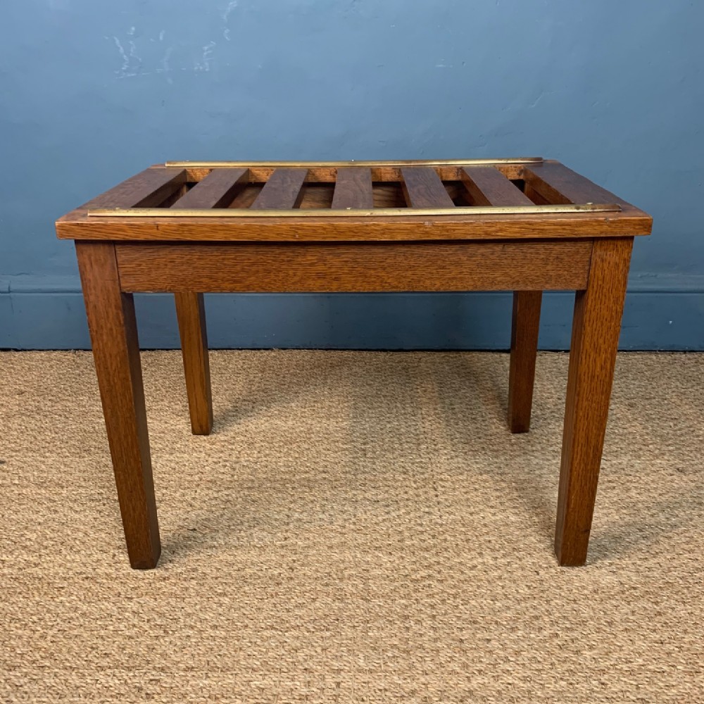 An Edwardian oak and brass luggage rack circa 1910