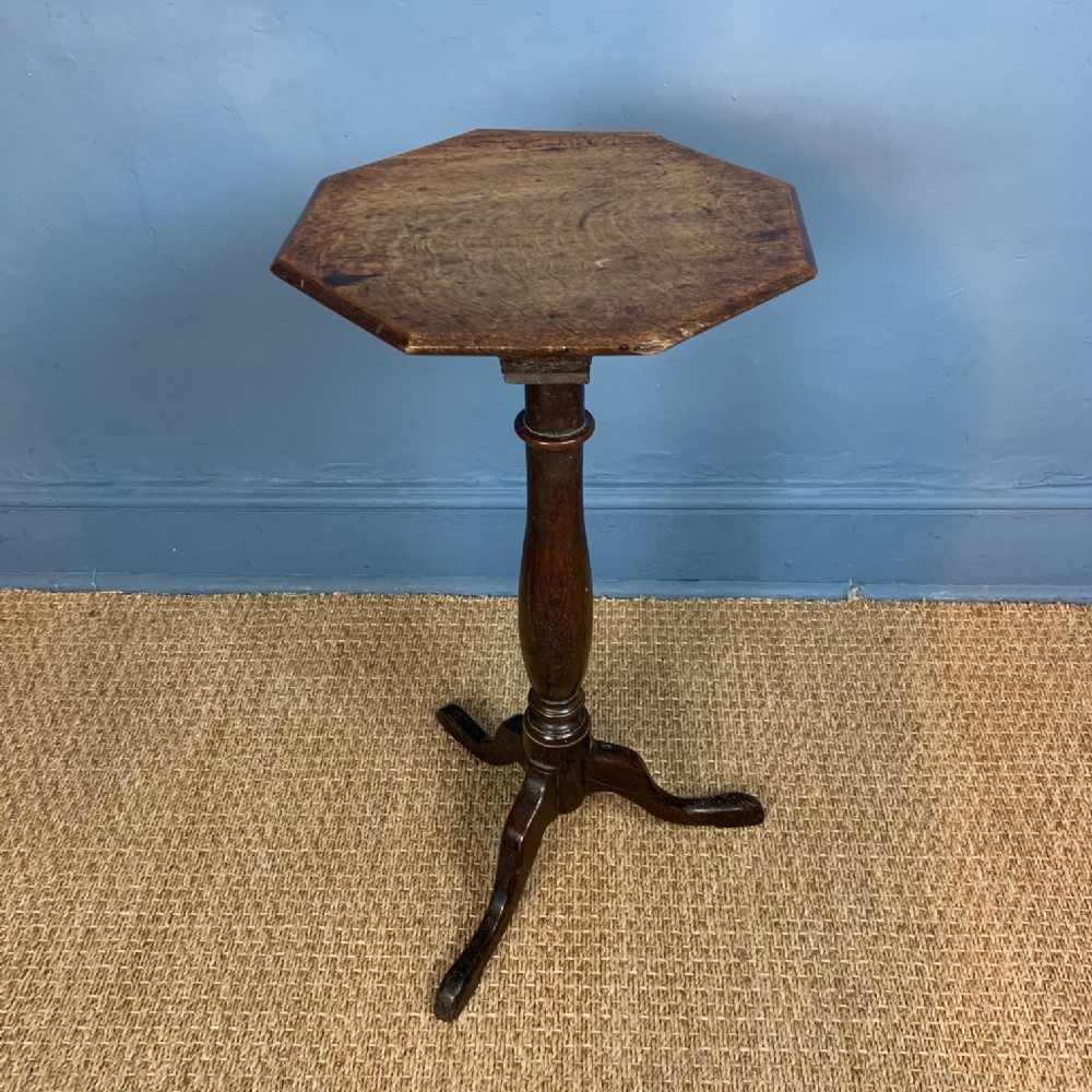 An early 19th oak octagonal top provincial tripod table . West Country c 1830
