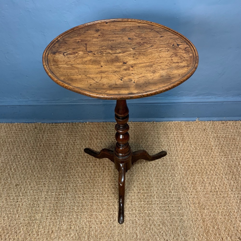 A George 11 ash dished top tripod table . West Country circa 1750