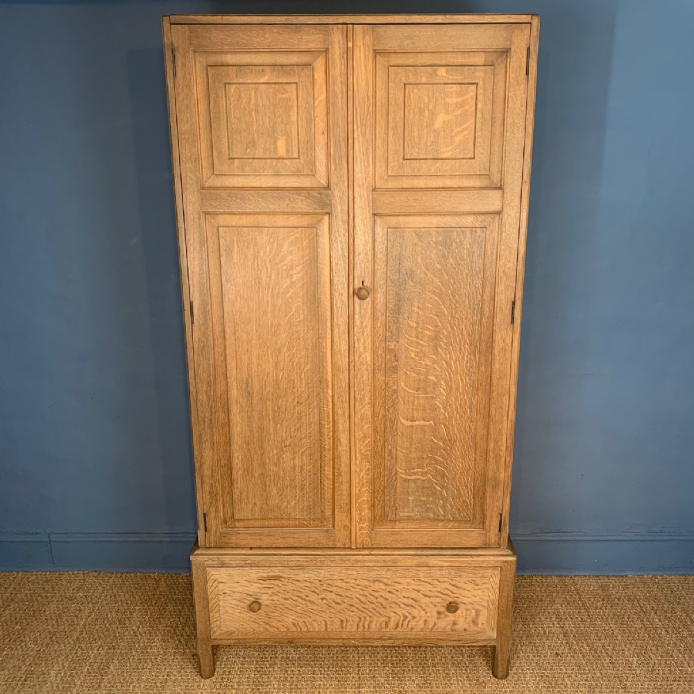 A Heals limed oak wardrobe circa 1930