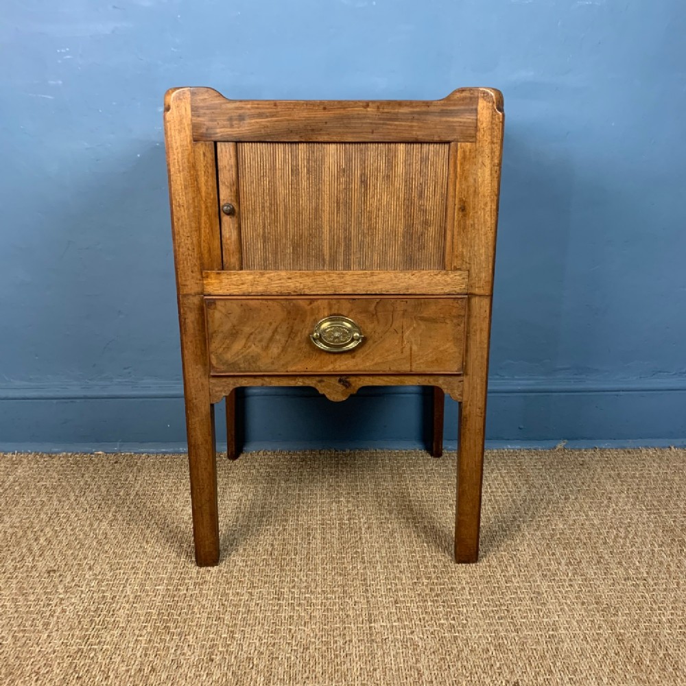 A George 111 faded mahogany bedside table circa 1780