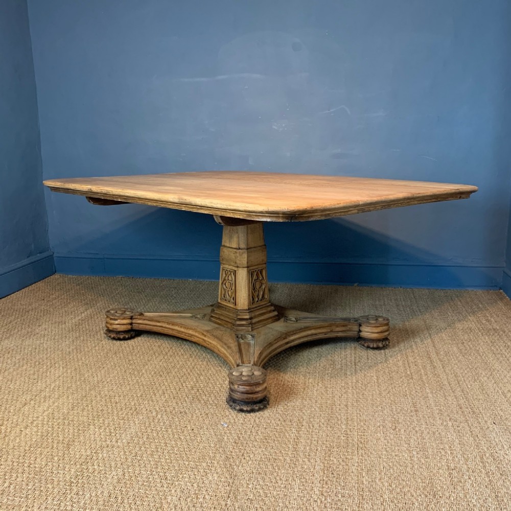 A large George IV dry oak centre table circa 1830 in the Gothic style.