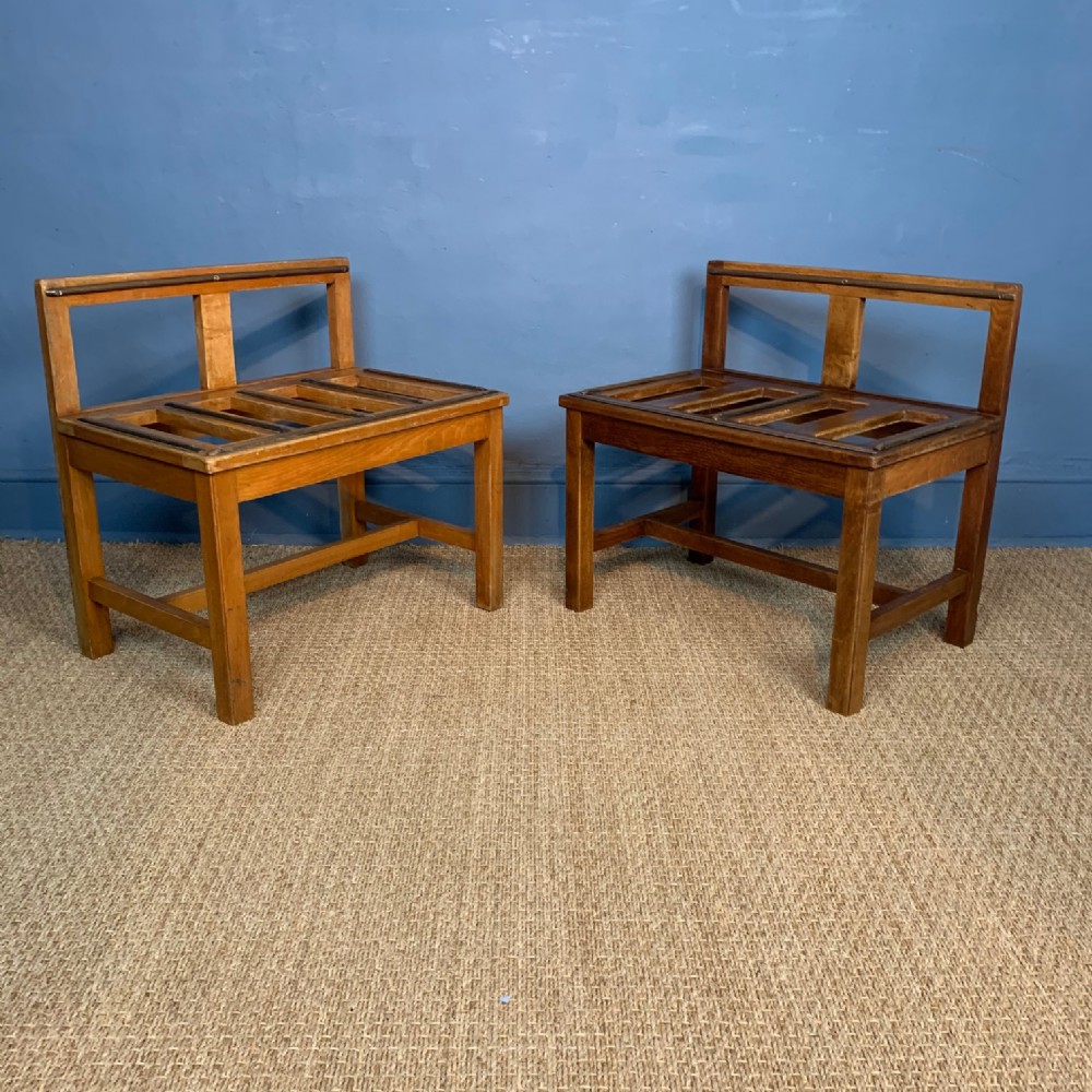 A pair of Edwardian walnut luggage racks circa 1910 