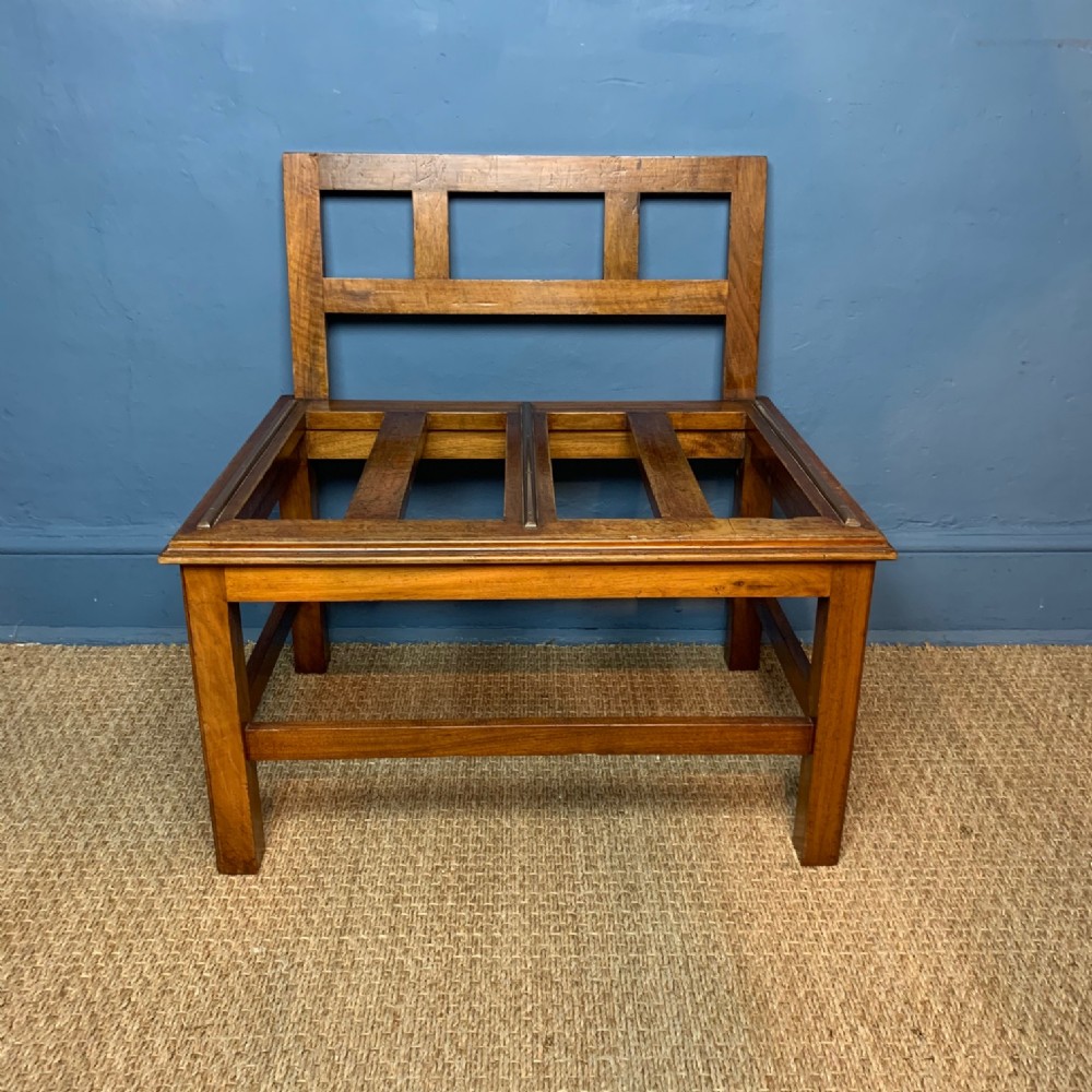 A large late Victorian single walnut luggage rack circa 1900 by Trollope and Co London