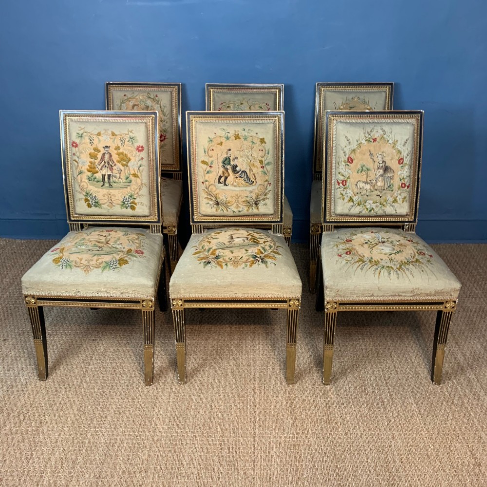 A set of six Louis Philippe ebonised and gilt side chairs circa 1840