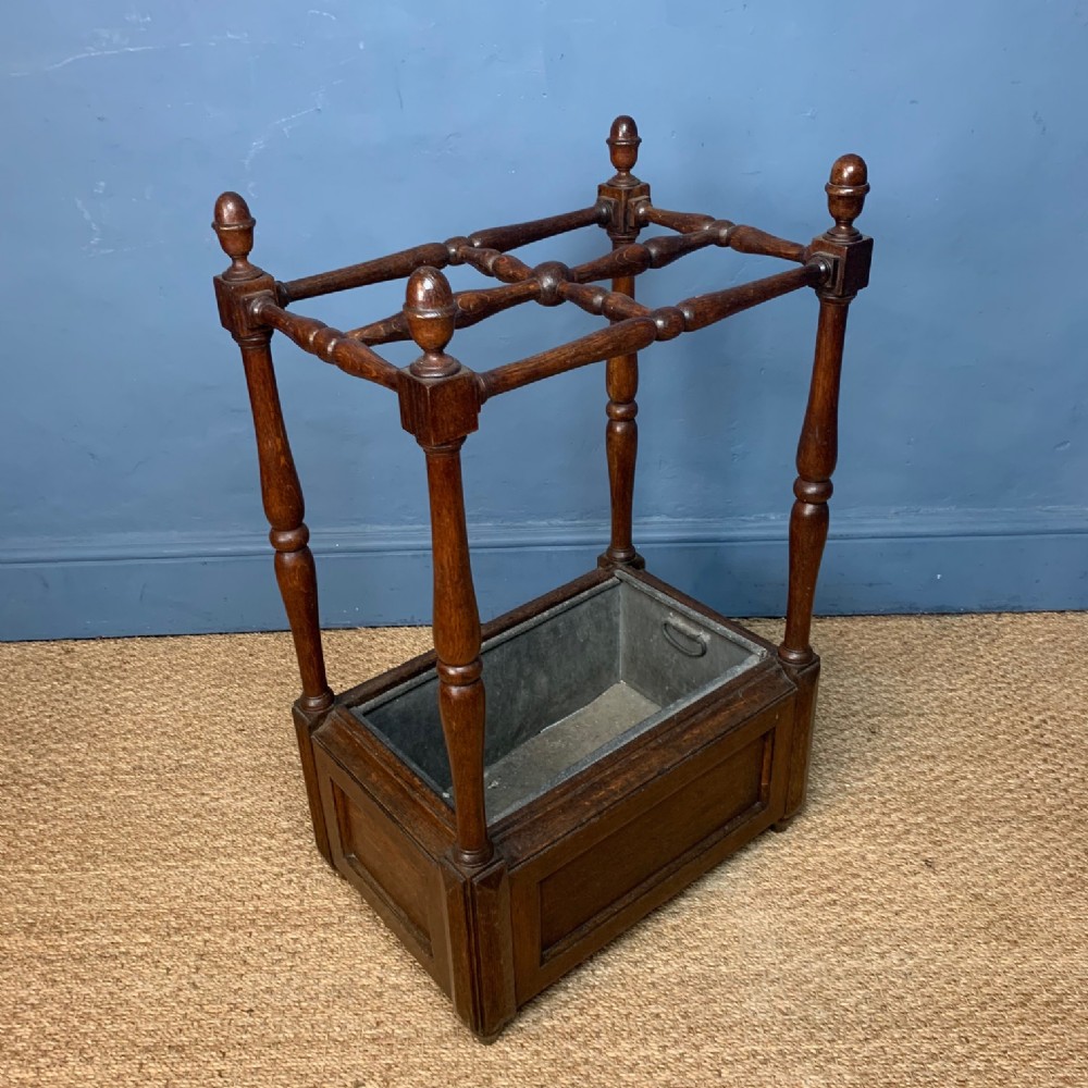 An Edwardian oak stick stand circa 1910