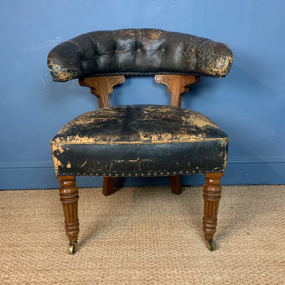 An Aesthetic Movement oak desk chair circa 1880